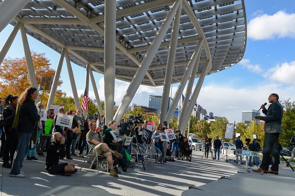 (Francisco Kjolseth | The Salt Lake Tribune) People gather to demand justice for the killing of Patrick Harmon who was shot by police on Aug. 13, when he tried to flee after being stopped on his bicycle. Around 150 people gathered for the rally at the Salt Lake City Public Safety Building on Sunday, Oct. 8, 2017, demanding Salt Lake County district attorney Sim Gill be fired for his 