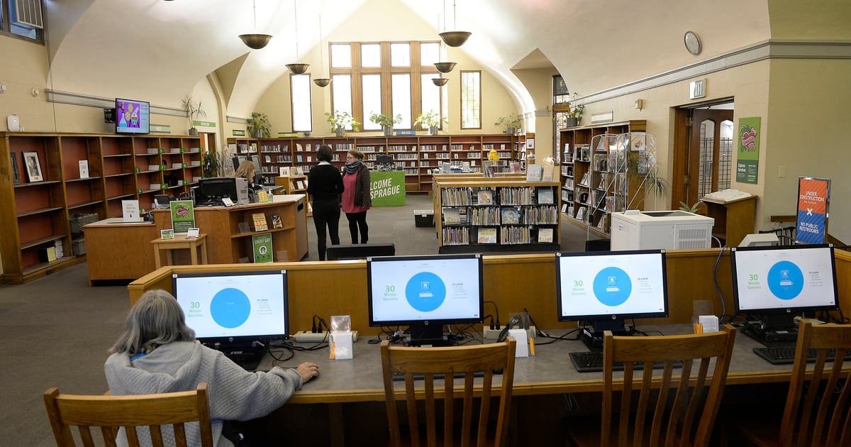 As Sprague Library partially reopens after devastating flood, ‘refugee