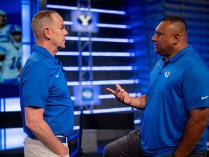 (Trent Nelson  |  The Salt Lake Tribune) Tom Holmoe and Kalani Sitake at BYU football media day in Provo on Wednesday, June 22, 2022.