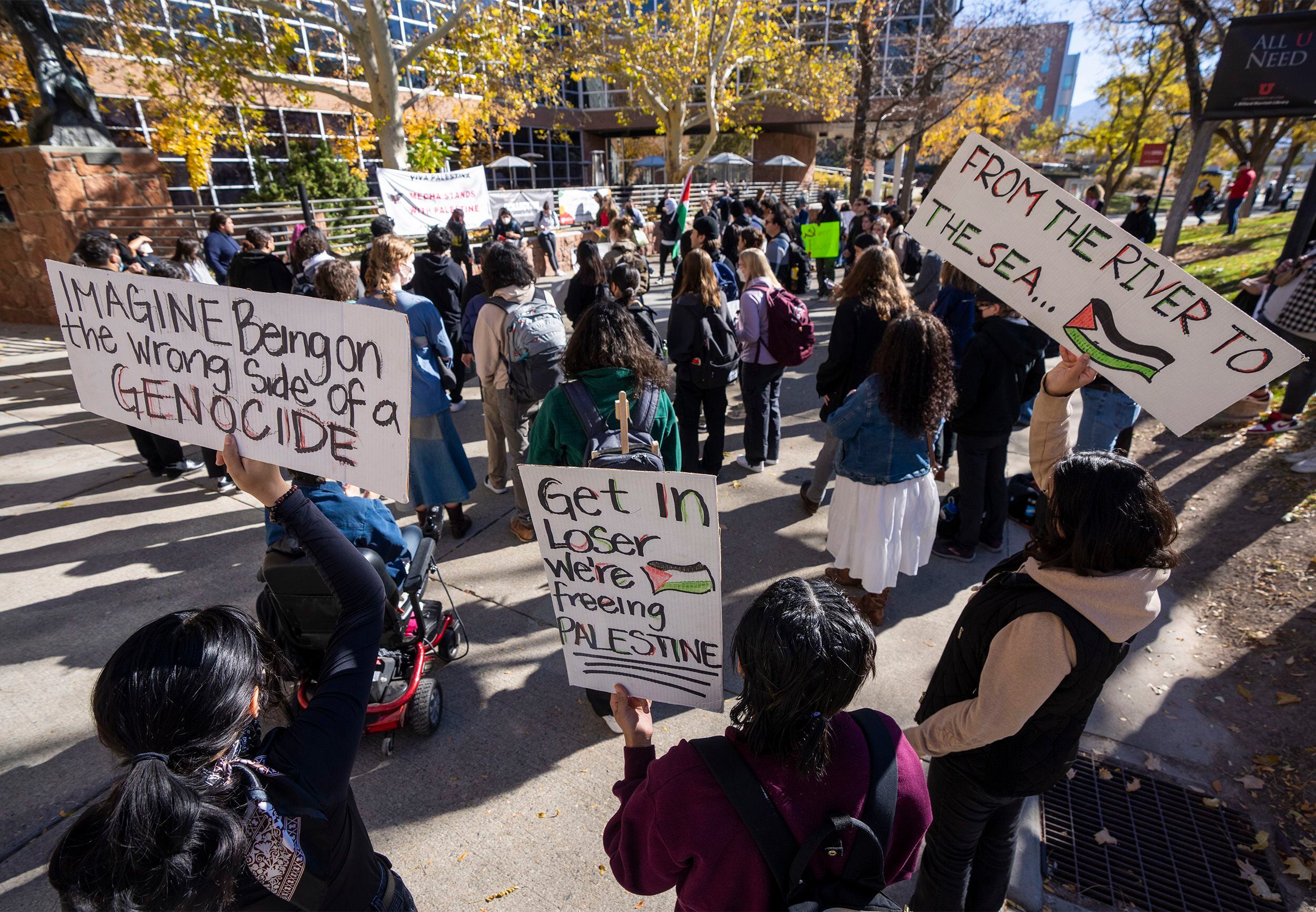 (Rick Egan | The Salt Lake Tribune) Supporters of Mecha cheer along with the speakers, during a protest on the University of Utah Campus, on Wednesday, Nov. 15, 2023.
