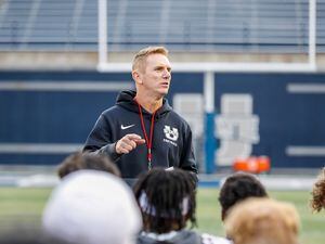 (Photo courtesy of Utah State Athletics) Utah State football coach Blake Anderson addresses the Aggies as he runs his first spring practice as the Aggies' coach.