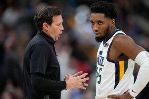 (Francisco Kjolseth | The Salt Lake Tribune) Utah Jazz coach Quin Snyder speaks with Utah Jazz guard Donovan Mitchell (45) during a time out during their game against the LA Clippers at Vivint Smart Home Arena in Salt Lake City, Wednesday, Dec. 15, 2021.