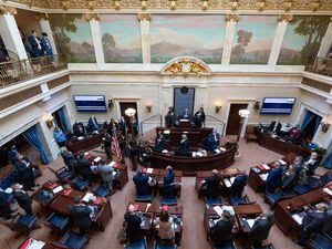 (Francisco Kjolseth | The Salt Lake Tribune) The Highway Patrol posts the colors for the start of the 2022 legislative session in the Senate chamber at the Utah Capitol in Salt Lake City on Tuesday, Jan. 18, 2022. 