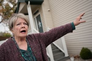 (Francisco Kjolseth | The Salt Lake Tribune) Marcia Walke, a politically active constituent who lives on the border of three congressional districts as proposed by Utah lawmakers, near 900 E 3900 South in Millcreek expresses her anger over the latest move by the Legislature exclaiming, “to allow this district to be split three ways is absolute greed…”