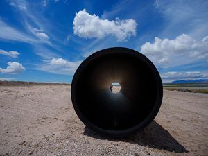 (Trent Nelson  |  The Salt Lake Tribune) Construction of North Davis Sewer District's new pipeline along the Antelope Island causeway on Tuesday, May 31, 2022.