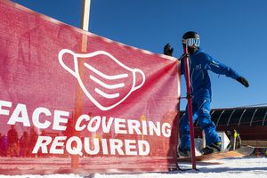 (Rick Egan | The Salt Lake Tribune) Skiers are required to wear face coverings they ski at Park City on opening day, Friday, Nov. 20, 2020.