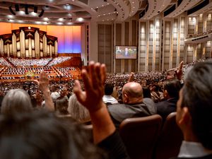 (Leah Hogsten  |  The Salt Lake Tribune) Latter-day Saints offer their sustaining vote to the church's leadership in April 2019.