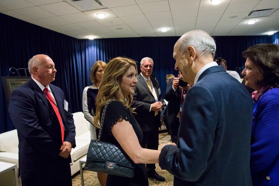 (Photo courtesy of The Church of Jesus Christ of Latter-day Saints) Barbara Poma, executive director of the onePULSE Foundation, chats with President Russell M. Nelson on Sunday, June 9, 2019, in Orlando.