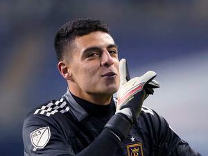 (Ted S. Warren | AP) Real Salt Lake goalkeeper David Ochoa motions to fans in a gesture to quiet them after the team's win over the Seattle Sounders in penalty kicks after a scoreless MLS first-round playoff soccer match Tuesday, Nov. 23, 2021, in Seattle.