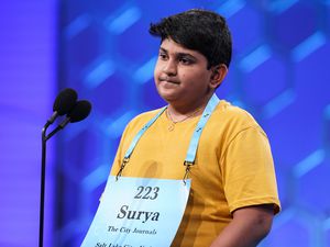 (AP Photo/Alex Brandon) Surya Kapu, 13, from South Jordan, competes during the Scripps National Spelling Bee, Wednesday, June 1, 2022, in Oxon Hill, Md.