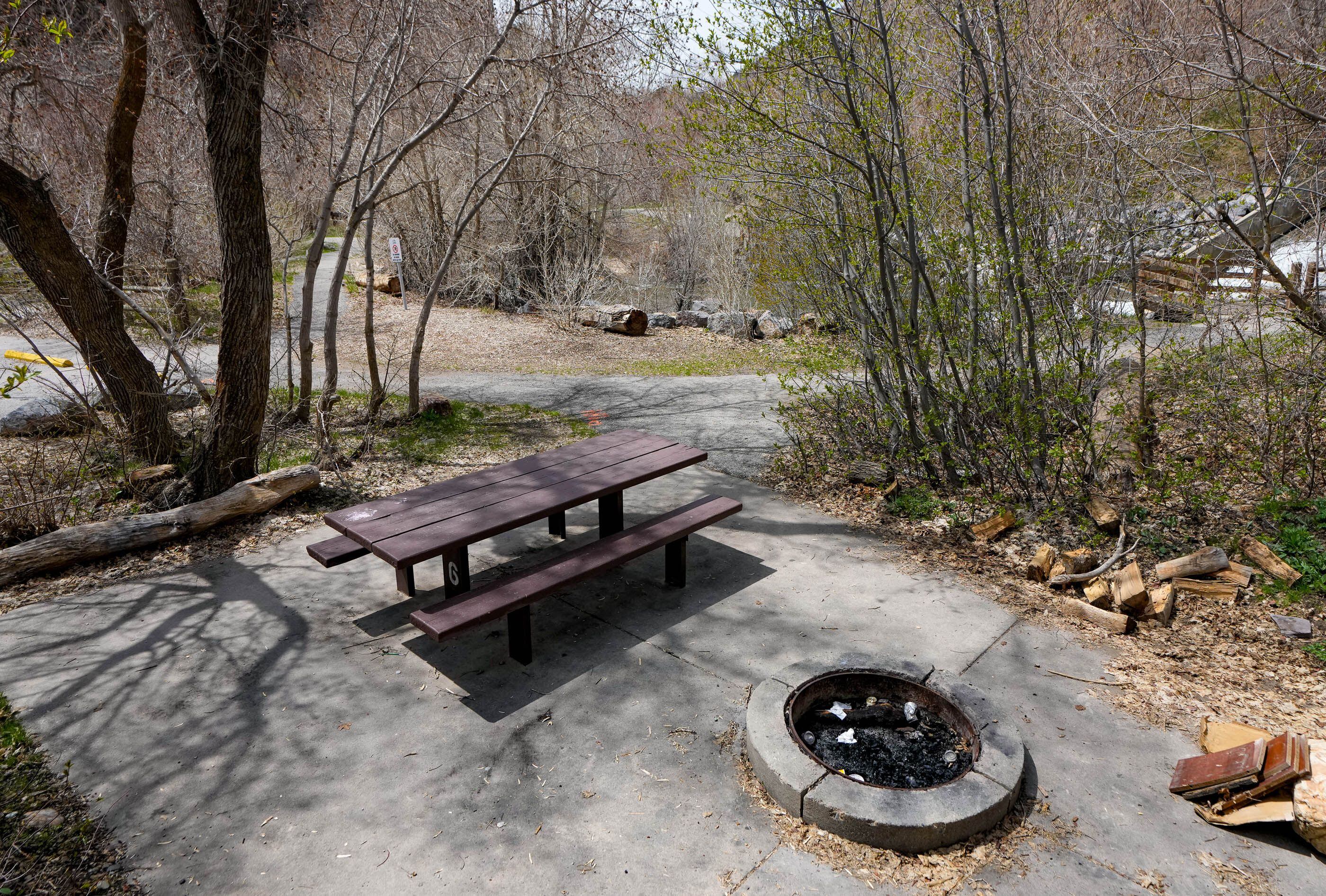 (Francisco Kjolseth  |  The Salt Lake Tribune) Site number 6 is next to Big Cottonwood Creek at Storm Mountain Picnic Area. Kamal Bewar, his children and friends had reserved the site last September but were asked to leave by camp hosts who accused them of leaving a fire burning and then called police. An officer ended up taking Bewar to the ground and detained him until backup arrived, which Bewar contends was an excessive use of force that traumatized the group. 