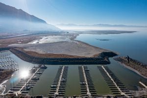 (Francisco Kjolseth | The Salt Lake Tribune) The Great Salt Lake marina is almost completely devoid of boats as persisting drought conditions continue to drop water levels and expose reef-like structures that resemble coral as seen on Tuesday, Dec. 7, 2021. 