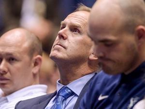 Leah Hogsten  |  The Salt Lake Tribune  BYU athletic director Tom Holmoe listens as BYU basketball coach Dave Rose talks about his career. Rose announced on Tuesday that he was retiring after a 14-year career in which he became BYUÕs all-time winningest menÕs basketball coach.