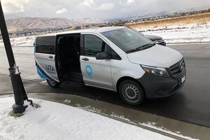 (Lee Davidson | Tribune file photo) A van for the UTA On Demand microtransit service opens the door for passengers to enter in Herriman.