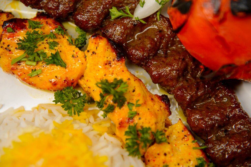 Persian kebabs and stews — spiked with nuts, herbs and spices — are a