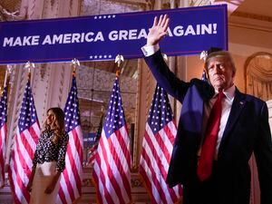 (Andrew Harnik | AP) Former President Donald Trump waves after announcing he is running for president for the third time at Mar-a-Lago in Palm Beach, Fla., Tuesday, Nov. 15, 2022. Trump has come under criticism for meeting with white supremacist Nick Fuentes last week at his Mar-a-Lago estate.