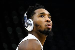 Utah Jazz guard Donovan Mitchell warms up before an NBA basketball game against the Cleveland Cavaliers Wednesday, Jan. 12, 2022, in Salt Lake City. (AP Photo/Alex Goodlett)