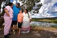 (Leah Hogsten | The Salt Lake Tribune) Tamra Borchardt-Slayton, right, Indian Peaks Band chairperson of the Paiute Indian Tribe of Utah and her family, husband Mike Slayton, daughter Chanel and son Carver pose for a photo at Indian Creek, Saturday, August 12, 2023.