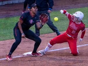 (Rick Egan | The Salt Lake Tribune)  Abby Dayton beats the throw to third base, in NCAA playoff action between the Utah Utes and the San Diego State Aztecs, on Friday, May 26, 2023.