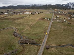(Trent Nelson | The Salt Lake Tribune) Creamery Lane cuts through land that is set to be developed in Hoytsville on Tuesday, April 25, 2023. The Summit County hamlet is bound to grow and longtime landowners have a vision for how that should happen.