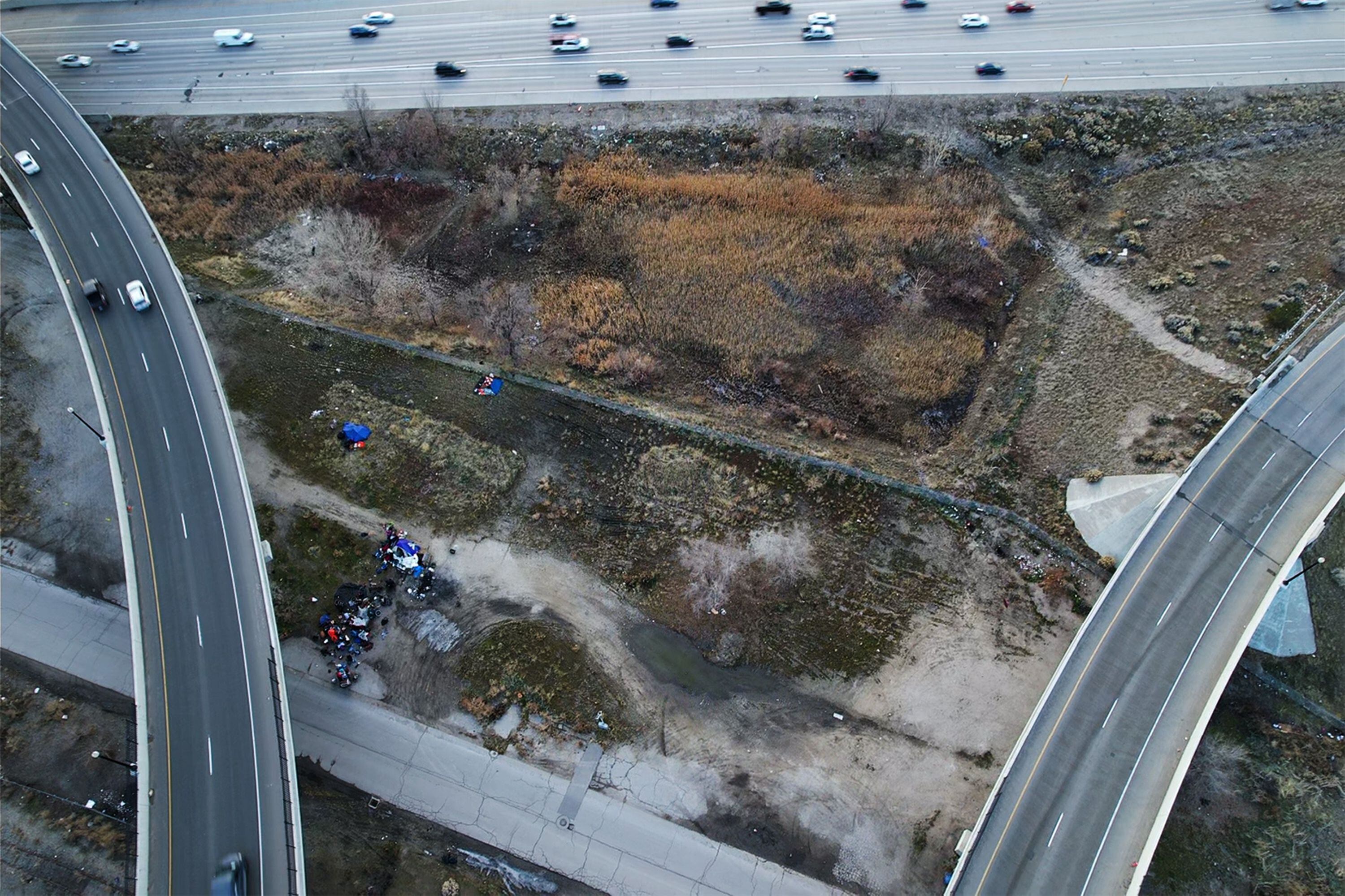 (Rick Egan | The Salt Lake Tribune)  The site of a possible legal homeless camp near I-15, on Wednesday, December 27, 2023.
