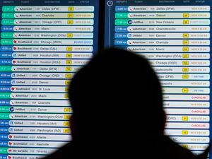 (Seth Wenig | AP) A display shows flights, many delayed, at LaGuardia Airport in New York, Wednesday, Jan. 11, 2023. A computer outage at the Federal Aviation Administration brought flights to a standstill across the U.S. on Wednesday, with hundreds of delays quickly cascading through the system at airports nationwide.
