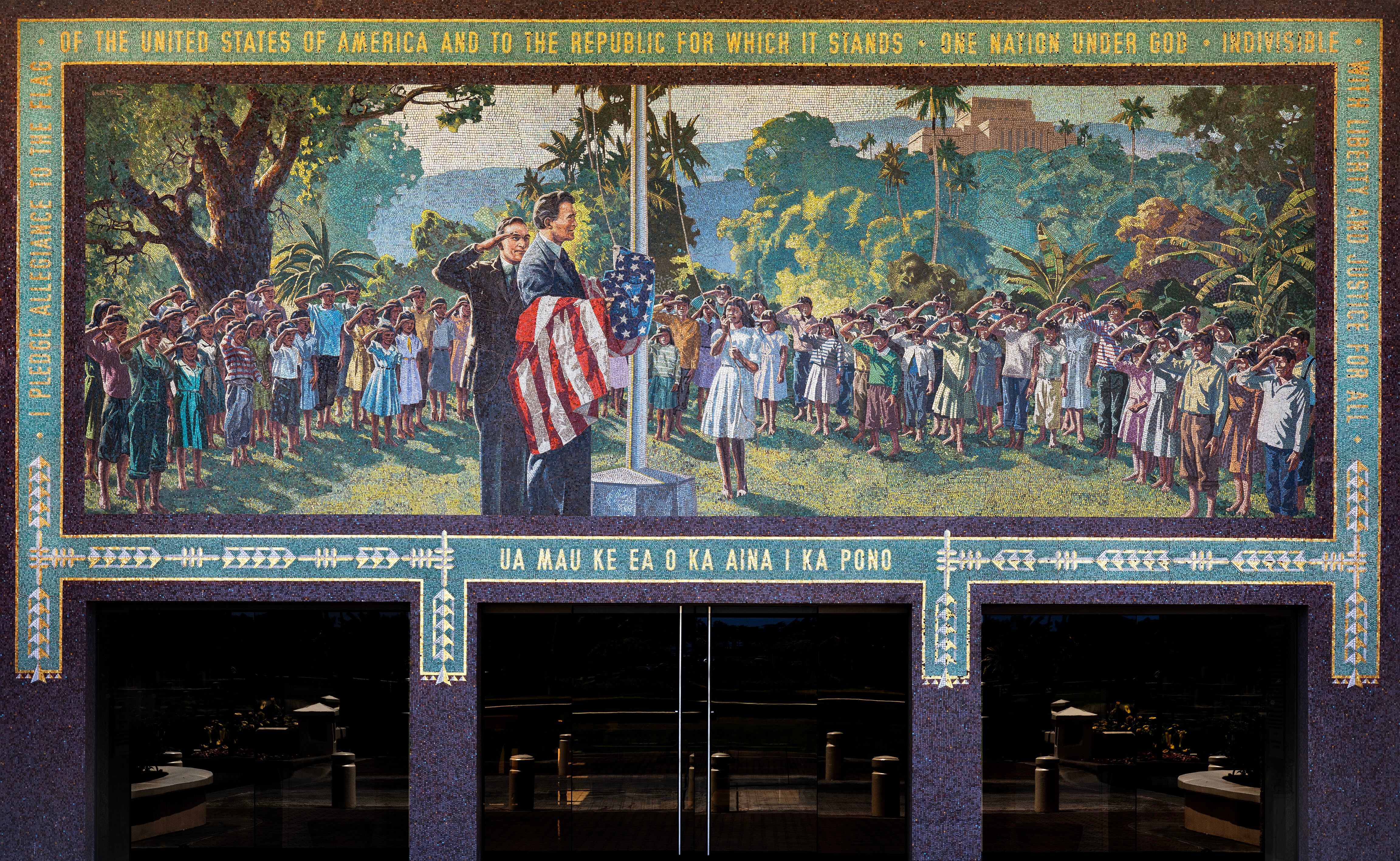 (Brigham Young University-Hawaii) The controversial mosaic designed by artist Edward T. Grigware stands at the entrance of the David O. McKay Building at Brigham Young University–Hawaii. In it, then-Elder McKay observes the flag-raising ceremony at the church’s mission school in Laie on Feb. 7, 1921.