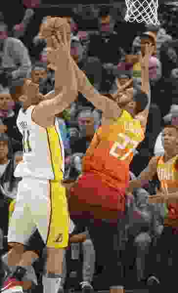 Is Rudy Gobert the defensive player of the year? Prominent NBA writers seem to think so.