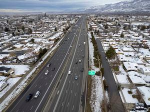 (Rick Egan | The Salt Lake Tribune) Homes border both sides of Interstate 15 in Woods Cross in January. Some community activists are still trying to stop a planned expansion of the freeway between Farmington and Salt Lake City.