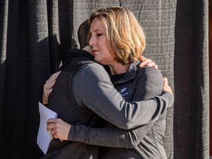 (Trent Nelson  |  The Salt Lake Tribune) Matt and Jill McCluskey, parents of Lauren McCluskey, embrace during a news conference announcing a settlement of their lawsuit against the University of Utah, in Salt Lake City on Thursday, Oct. 22, 2020.