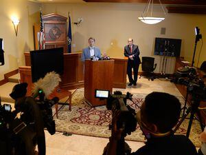 (Francisco Kjolseth  |  The Salt Lake Tribune) Attorneys Jim McConkie, left, and Brad Parker address the media on Monday, May 18, 2020, after their clients Jill and Matt McCluskey (via zoom) joined the press event at the attorney's offices in Murray, regarding newly discovered evidence and recent developments in Lauren McCluskey's case.