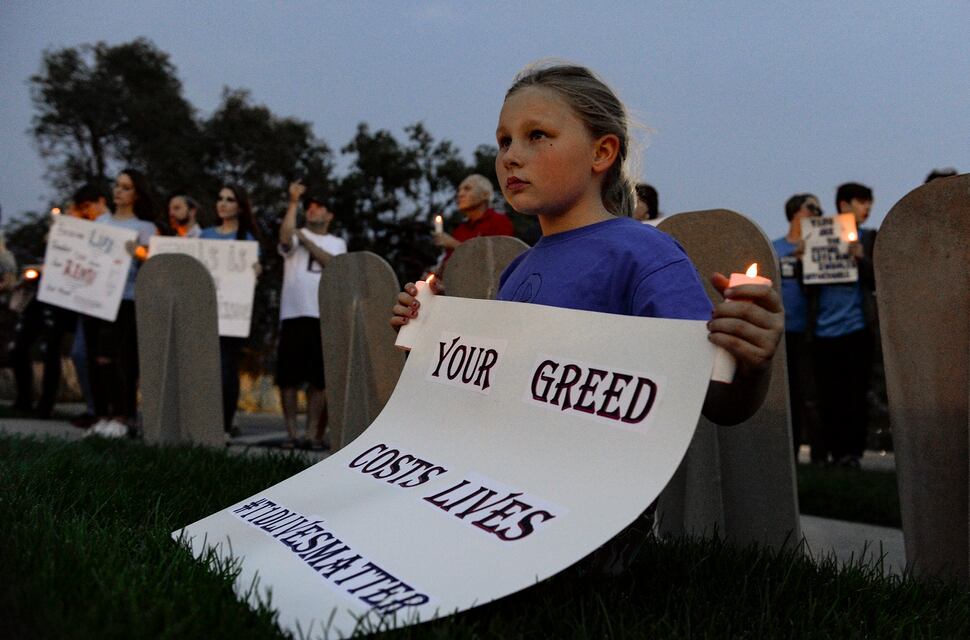 (Leah Hogsten | The Salt Lake Tribune) Lucy Thomas, 8, and her family rally on behalf of her sister Grace, 13, who has Type 1 diabetes. Diabetes patients, their families and supporters rallied for those struggling with the high cost of insulin and paid tribute to those who have died from the disease on the Capitol lawn, Saturday, Sept. 7, 2019.