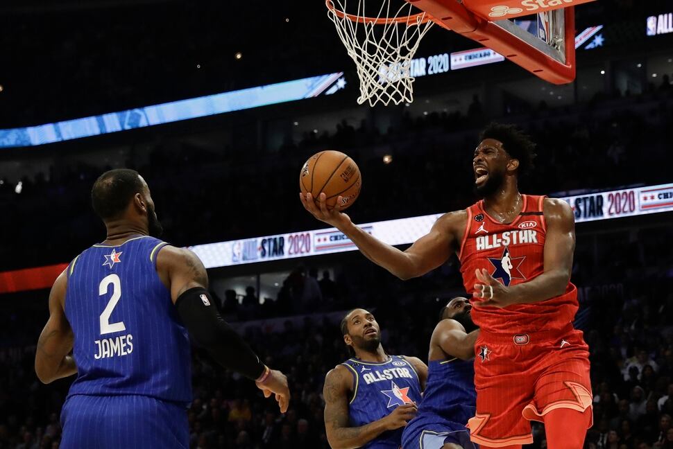 Joel Embiid of the Philadelphia 76ers shoots during the second half of the NBA All-Star basketball game Sunday, Feb. 16, 2020, in Chicago. (AP Photo/Nam Huh)