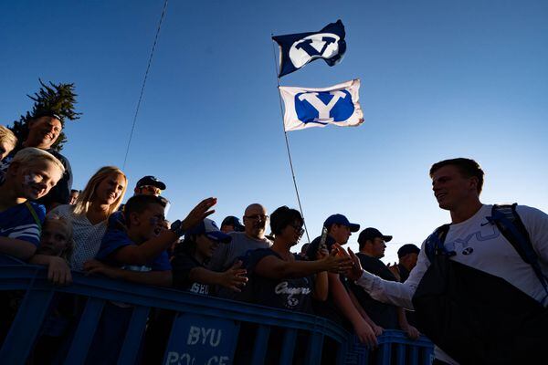 (Francisco Kjolseth | The Salt Lake Tribune) Cougar fans cheer on their team as they arrive at LaVell Edwards Stadium in Provo, Saturday, Sept. 25, 2021, for their game against South Florida. On Saturday, BYU football commit Parker Kingston won the 6A state title in the 100-meters in Provo.