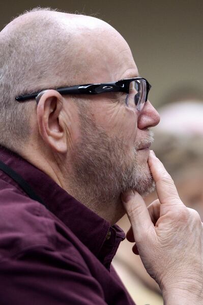 (Leah Hogsten | The Salt Lake Tribune) Mark Wilson of Riverton listens as candidates from Senate District 11 make their speeches at the Utah Republican Nominating Convention Saturday, April 21, 2018 at the Maverik Center. 