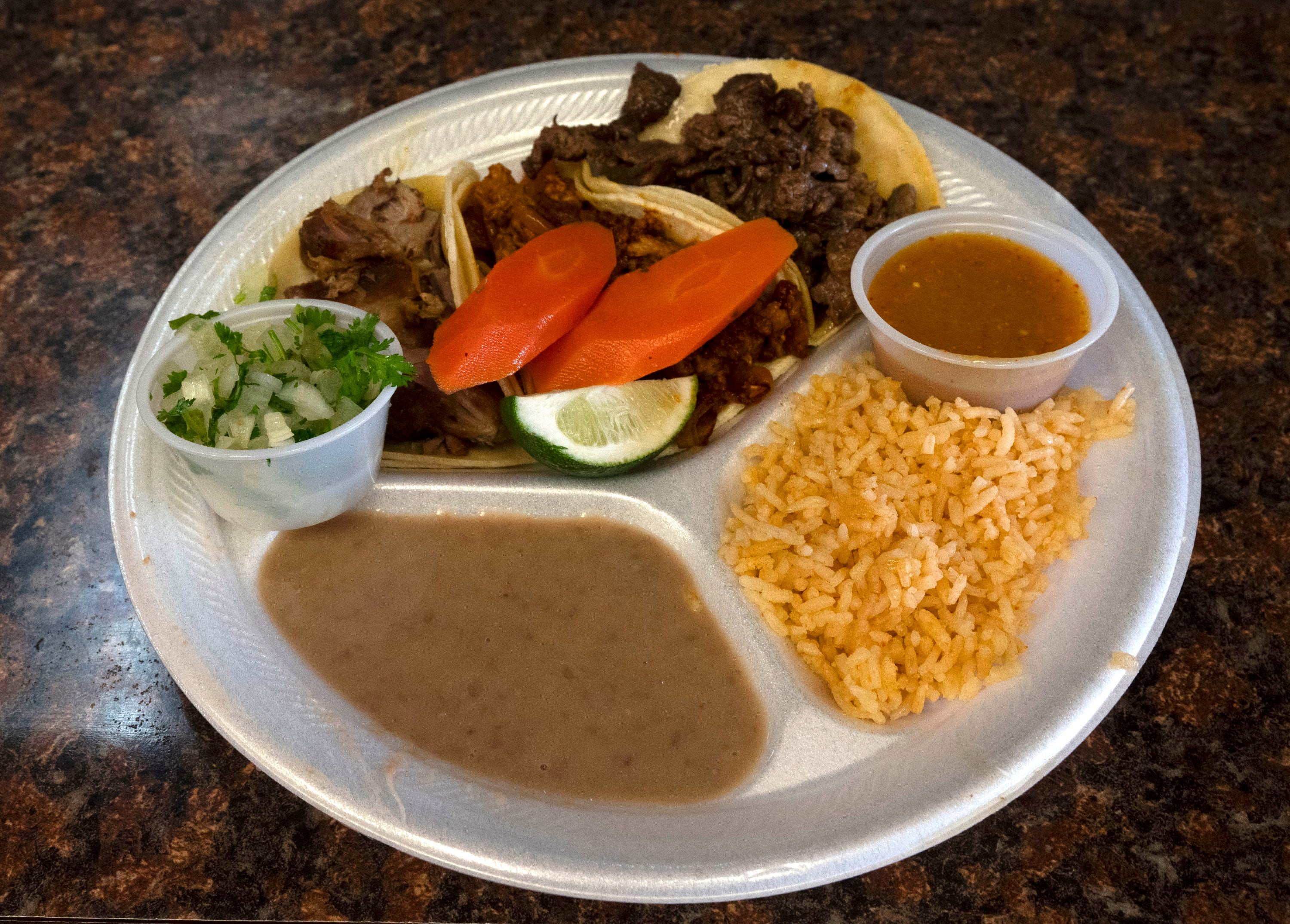 (Rick Egan | The Salt Lake Tribune)  Taco Plate at Taqueria El Ray De Oros Mexican restaurant on Redwood Road, on Monday, April 1, 2024.
