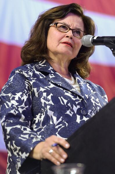 (Leah Hogsten | The Salt Lake Tribune) Convention chairwoman Enid Greene Mickelsen tries to maintain order with the raucous crowd at the Utah Republican Nominating Convention Saturday, April 21, 2018 at the Maverik Center. 