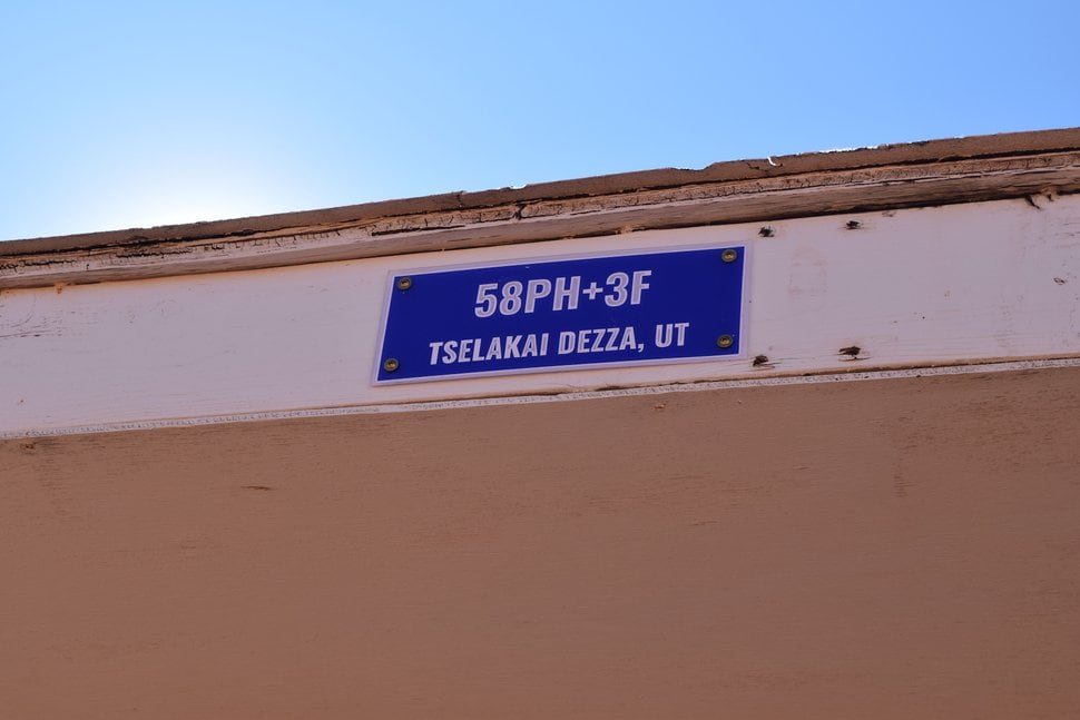 (Courtesy of Rural Utah Project) A Plus Code sign on a home on the Navajo Nation in San Juan County, Utah.