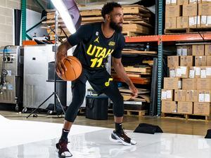 (Rick Egan | The Salt Lake Tribune)  Utah Jazz guard Mike Conley poses for the Jazz photographer in a back room of Vivint Arena, surrounded by cardboard boxes and ice cream machines, during the Utah Jazz Media Day, on Monday, Sept. 26, 2022.