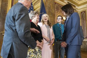 (Leah Hogsten | The Salt Lake Tribune) Judge Diana Hagen, center, laughs at her father Terry Roundy as her mother Denice Roundy and son Archer greet Lt. Gov. Deidre Henderson on Tuesday at the Capitol. Gov. Spencer J. Cox  nominated Utah Court of Appeals Judge Diana Hagen to serve as a Utah Supreme Court Justice, March 29, 2022. 
