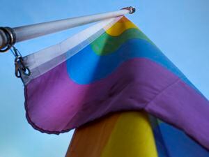 (Leah Hogsten | The Salt Lake Tribune) The Pride flag waves at a Utah home on Feb. 12, 2022. A state lawmakers published a bill on Thursday, Feb. 23, 2023, that would prohibit some elementary classroom discussions of gender identity and sexual orientation.