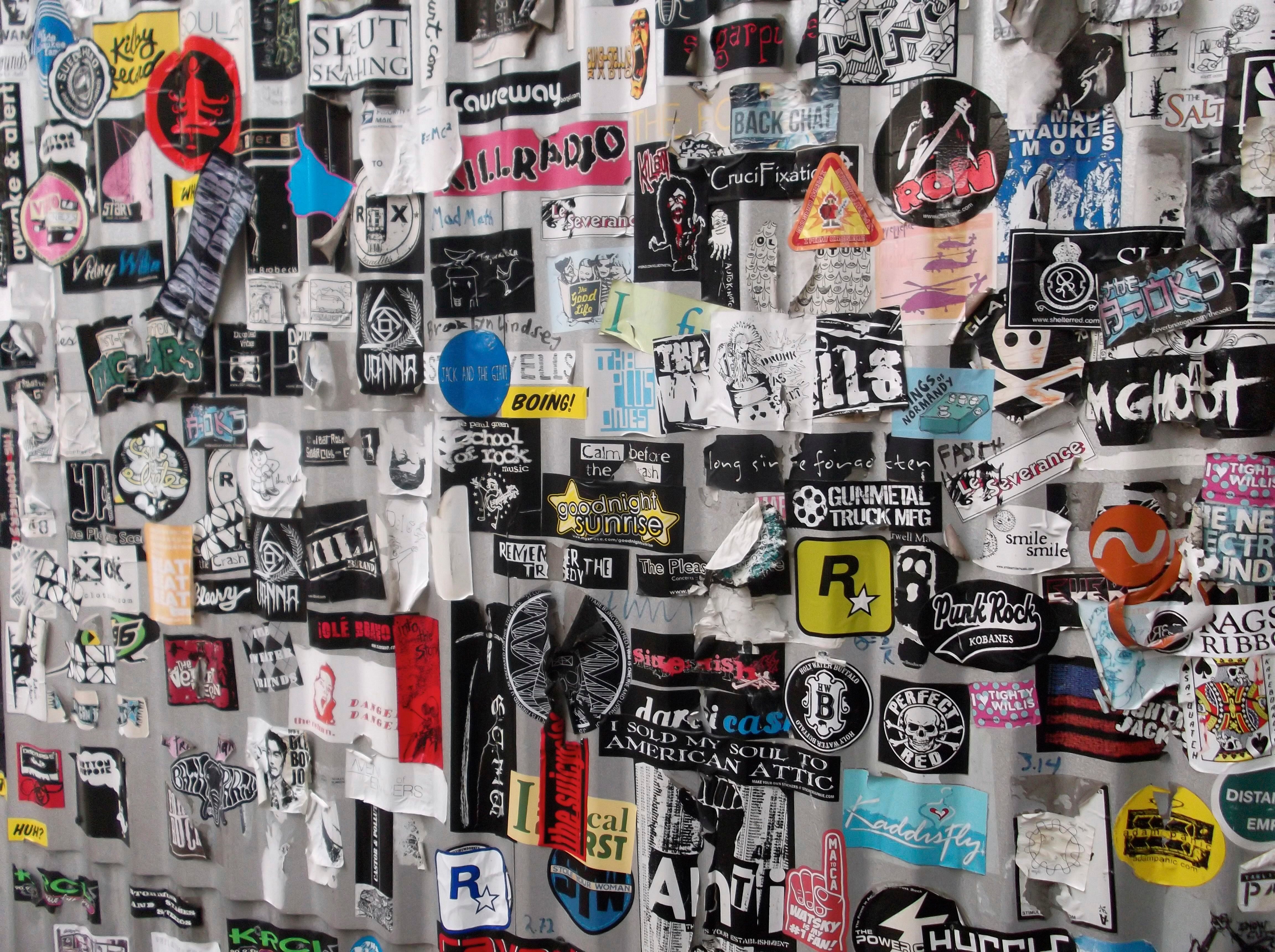 (Sean P. Means  |  Tribune file photo) A wall of stickers at Kilby Court in Salt Lake City shows the many bands that have played there. The all-ages music venue turns 20 this year.