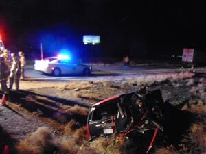 (Utah Department of Public Safety) A black Cadillac Escalade is photographed after crashing off of Interstate 70 in Sevier County on Sunday, Jan. 9, 2022.