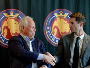 (Francisco Kjolseth  |  The Salt Lake Tribune) Utah Royals FC owner Dell Loy Hansen, left, shakes hands with his new head coach, former Chicago Red Stars assistant Craig Harrington during a press event at Rio Tinto Stadium in Sandy, Utah on Friday, Feb. 7, 2020.