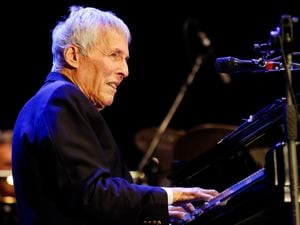 (Luca Bruno | AP file photo) Composer Burt Bacharach performs in Milan, Italy on July 16, 2011. The Grammy, Oscar and Tony-winning Bacharach died of natural causes Wednesday, Feb. 8, 2023, at home in Los Angeles, publicist Tina Brausam said Thursday. He was 94.