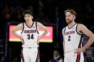 (Young Kwak | AP) Gonzaga center Chet Holmgren (34) and forward Drew Timme (2) stand on the court during the second half of an NCAA college basketball game against North Alabama last month. It has been 23 months since Gonzaga lost a West Coast Conference game, a streak BYU hopes to end this week in Spokane.