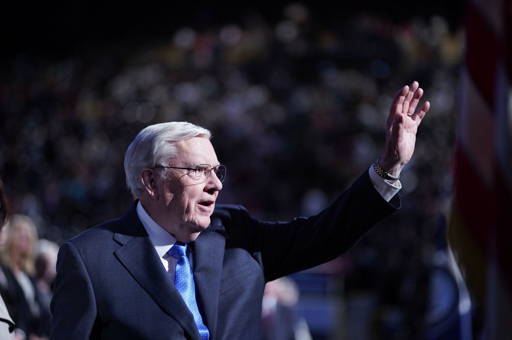 (Photo Courtesy of Brigham Young University) President M. Russell Ballard of the Quorum of the Twelve Apostles waves goodbye after speaking to BYU students at the Marriott Center on March 3, 2020.