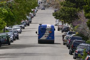 (Leah Hogsten | The Salt Lake Tribune) A Utah Transit Authority bus travels west on 6th Avenue, Friday, May 13, 2022.