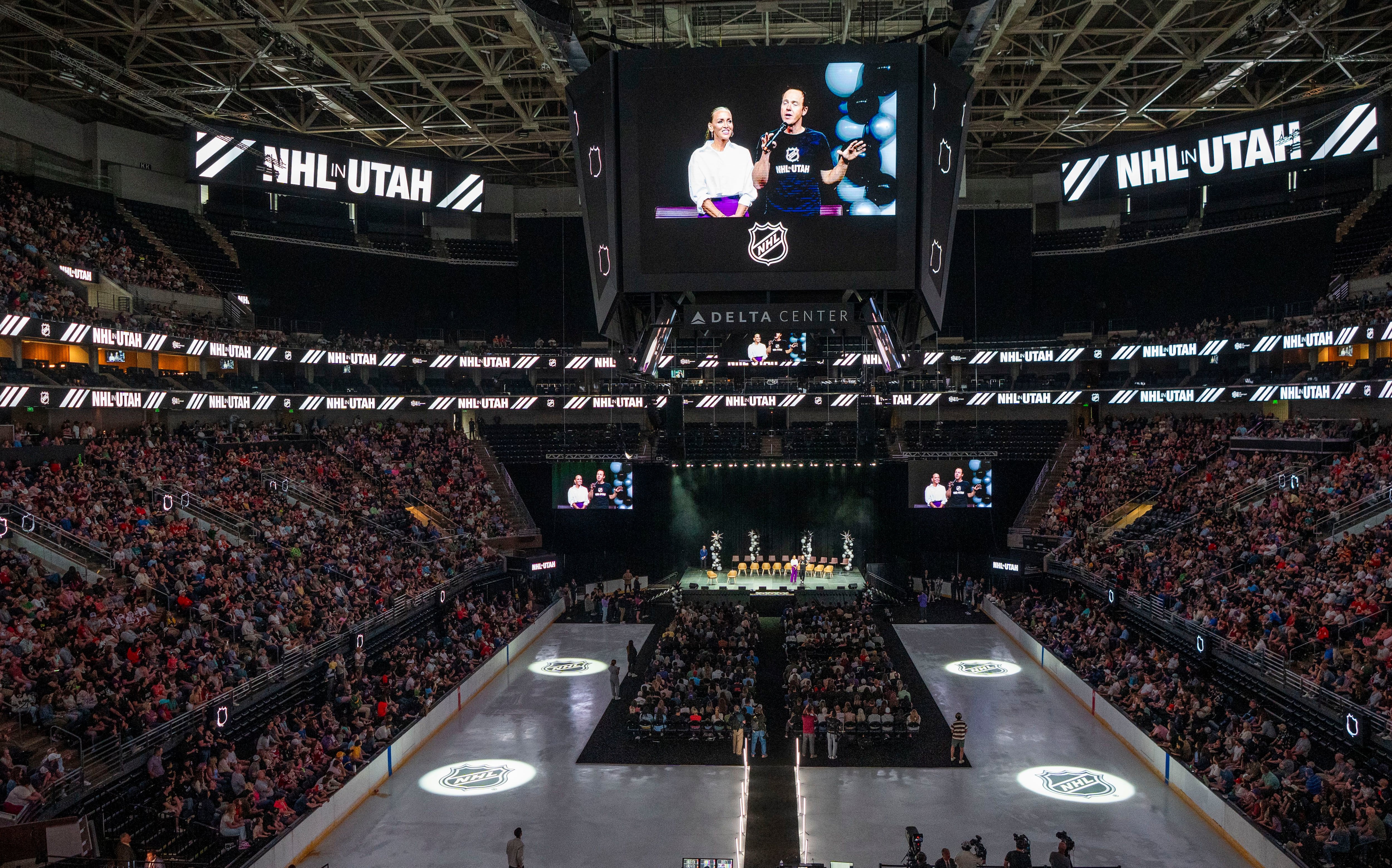 (Rick Egan | The Salt Lake Tribune) The Delta Center is photographed during an introduction for the Utah NHL team on Wednesday, April 24, 2024. On screen are team owners Ryan and Ashley Smith.