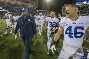 (Rick Egan  |  The Salt Lake Tribune) Brigham Young head coach Kalani Sitake smiles as the Cougars celebrate their win  42-14 win over the Aggies, in football action between Brigham Young Cougars and Utah State Aggies in Logan on Nov. 2, 2019. Monday, BYU announced a wave of new hires to help the Cougars' football program move closer in size to other Big 12 schools.